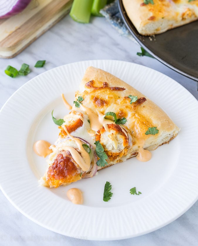 The combination of Buffalo Wings and Pizza in a creamy and cheesy Buffalo Ranch Chicken Pizza! So good with Hidden Valley's new Buffalo Ranch dressing! 
