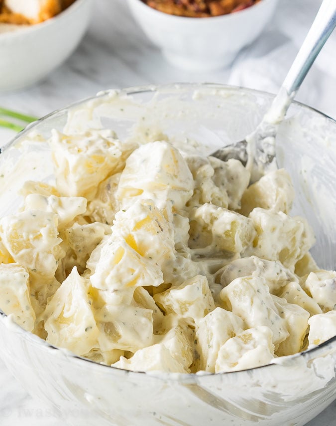 This Chicken Bacon Ranch Potato Salad is full of crispy chicken, bacon and creamy ranch dressing! Everyone loves this simple salad!