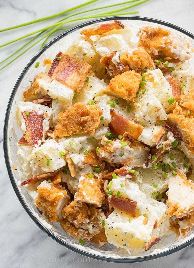 This Chicken Bacon Ranch Potato Salad is full of crispy chicken, bacon and creamy ranch dressing! Everyone loves this simple salad!