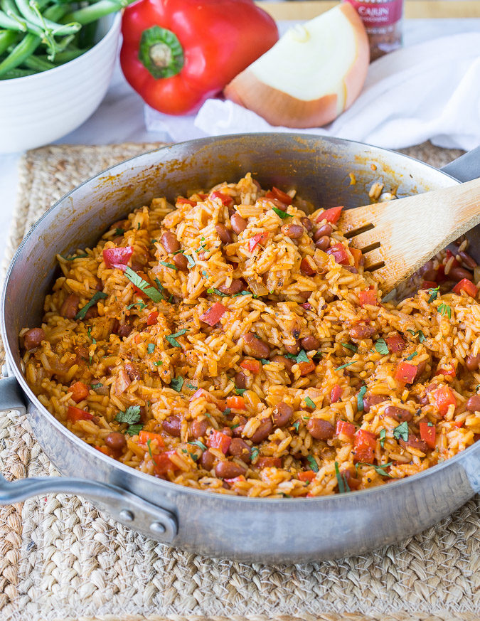 I'm in love with this one skillet Dirty Red Beans and Rice! It's a super quick side dish recipe, but can easily be turned into a main course by adding sliced andouille sausage! 