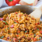 I'm in love with this one skillet Dirty Red Beans and Rice! It's a super quick side dish recipe, but can easily be turned into a main course by adding sliced andouille sausage!