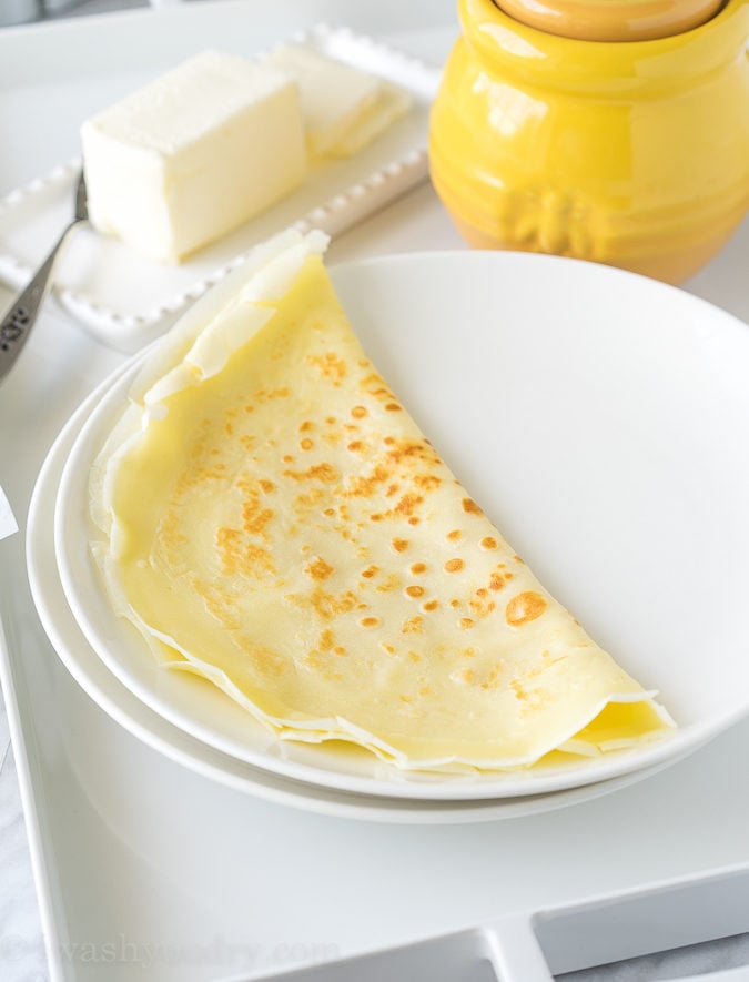 These Honey Butter Crepes are super simple to make and are filled with soft butter then drizzled with sweet honey. Perfect for breakfast in bed!