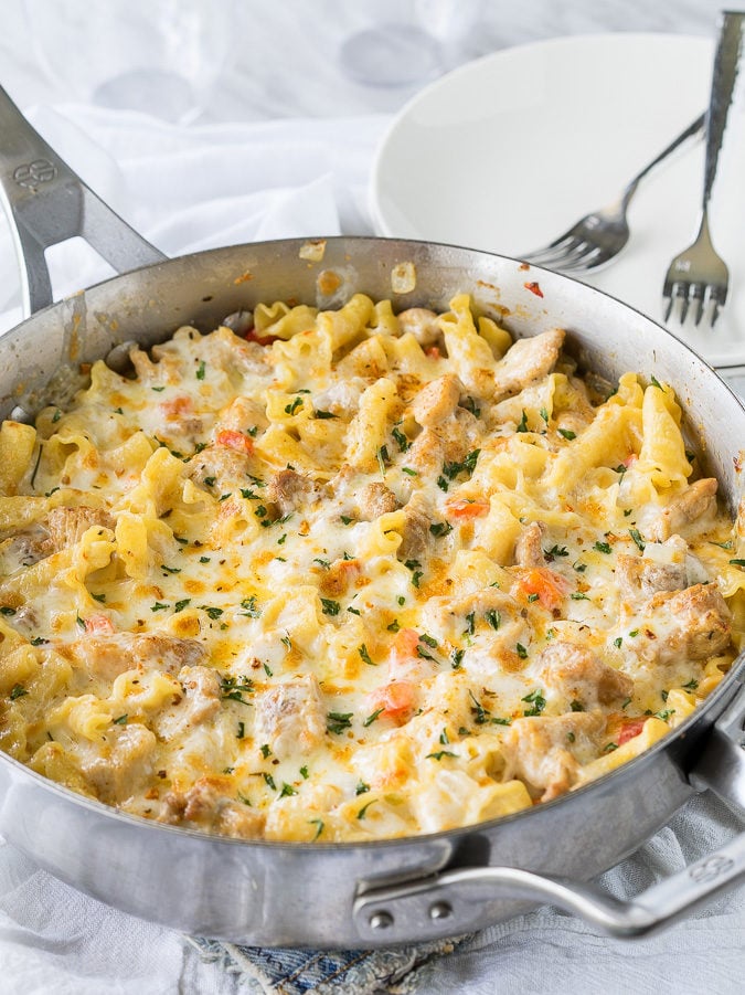 This Cajun Chicken Pasta Skillet is creamy, cheesy and slightly spicy ! This easy dinner recipe is made in just one skillet too!