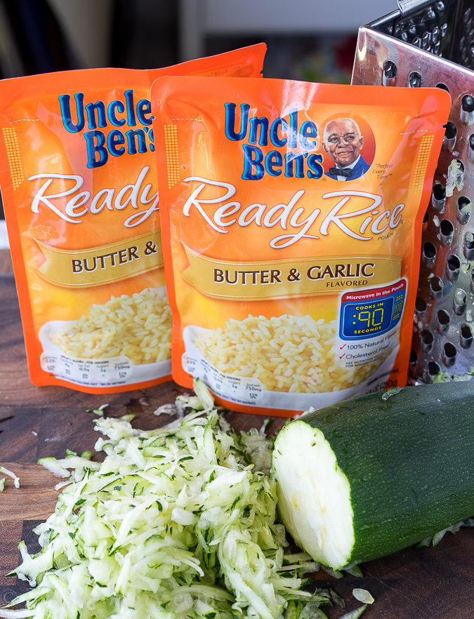 I love making this 5 minute Cheesy Zucchini Rice recipe for a quick and easy side dish! Even my kids get in there and help too!