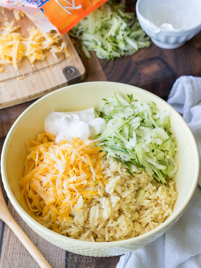 I love making this 5 minute Cheesy Zucchini Rice recipe for a quick and easy side dish! Even my kids get in there and help too!