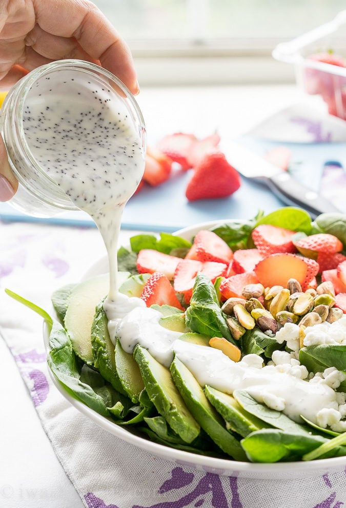 This Avocado Strawberry Spinach Salad is a quick and easy lunch recipe that's perfect for hot summer days!