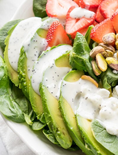 This Avocado Strawberry Spinach Salad is a quick and easy lunch recipe that's perfect for hot summer days!