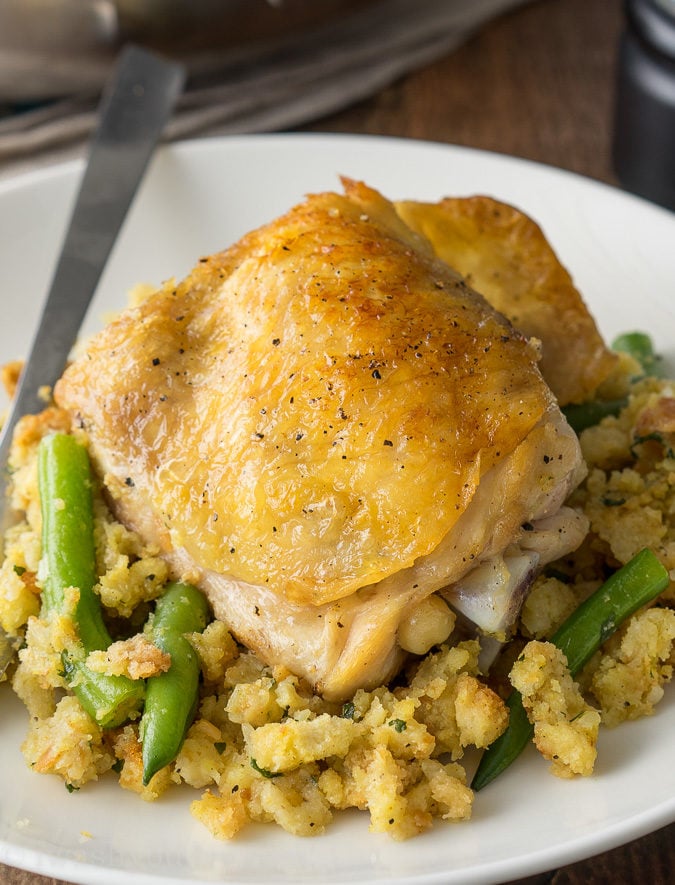 My family loves this Chicken and Stuffing Skillet! It's all made in one pan and it's a complete meal with veggies and a side of stuffing!