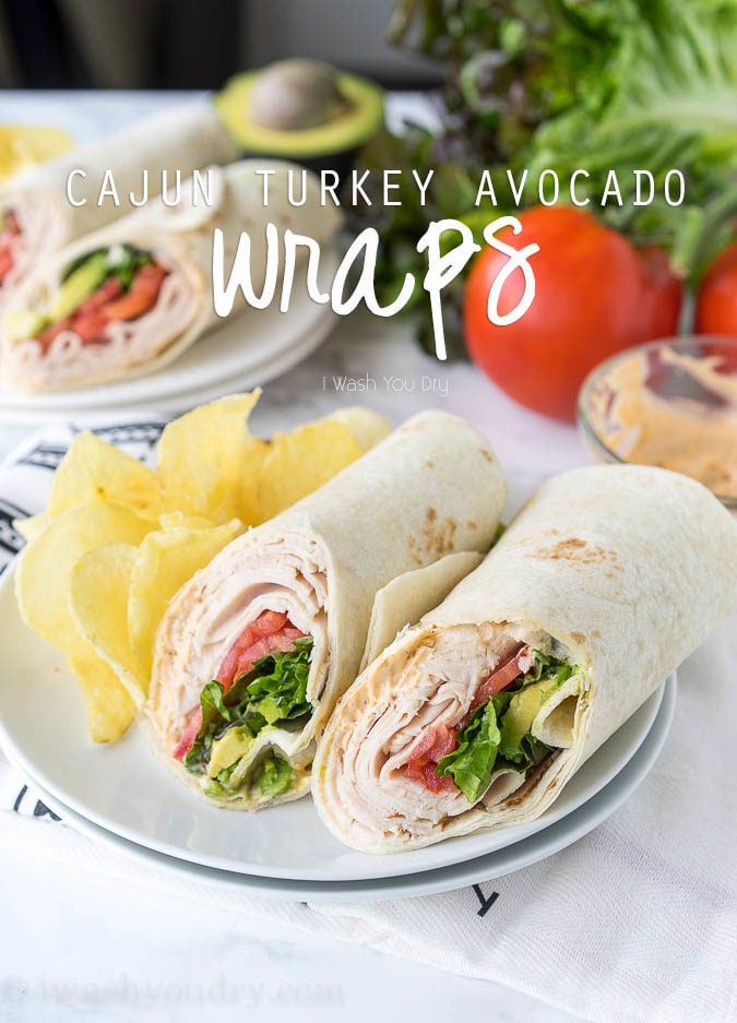 These Cajun Turkey Avocado Wraps are the perfect way to spruce up your lunch box! Filled with thinly sliced deli turkey, plump tomatoes, creamy avocado and a zippy cajun mayo, these wraps are bursting with flavor!