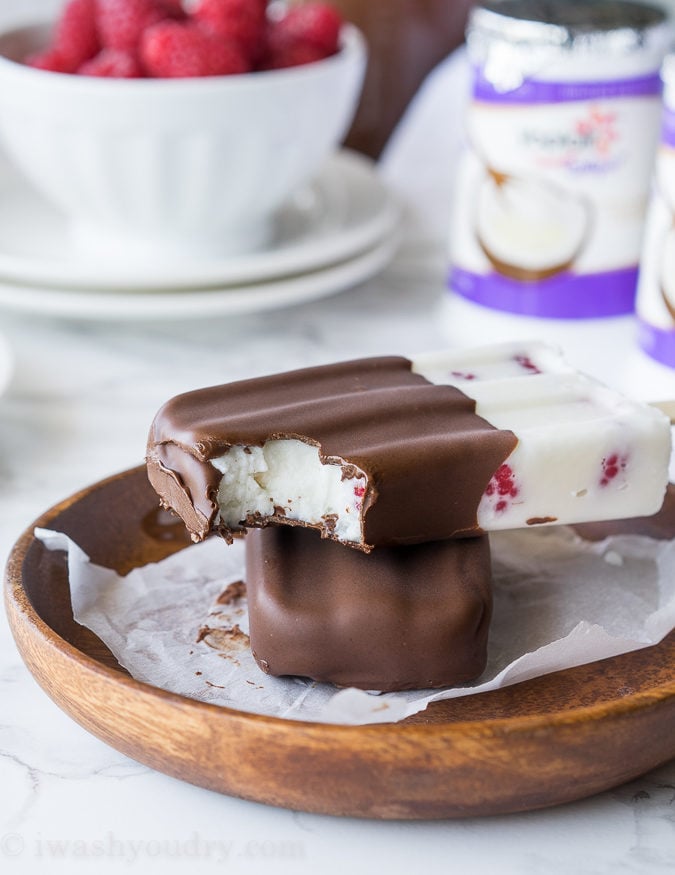 These Raspberry Coconut Fro-Yo Popsicles are just 4 ingredients (including the chocolate!). So fresh and creamy!