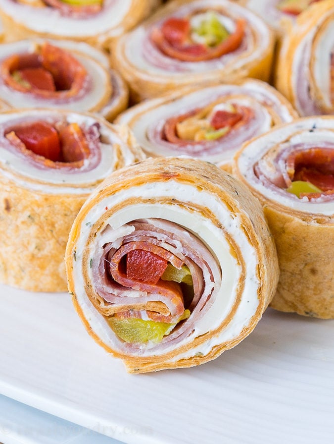 These super flavorful Italian Pinwheels are a fantastic appetizer or perfect for school lunches!