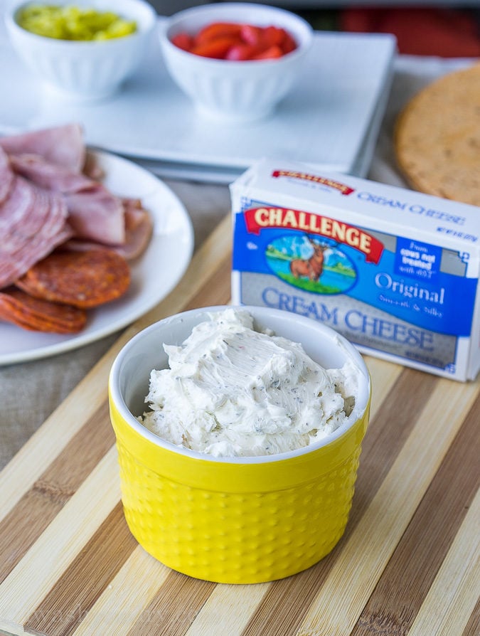 Cream cheese base for pinwheel recipe on cutting board