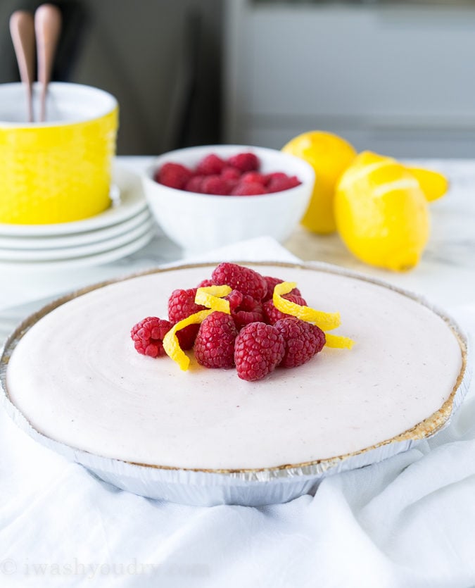 Frozen pie with raspberries and lemon swirls