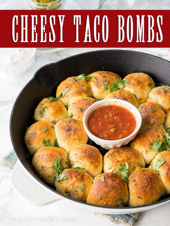 This Cheesy Taco Bombs Skillet is a quick and easy appetizer recipe that's filled with tender taco meat and gooey cheese!