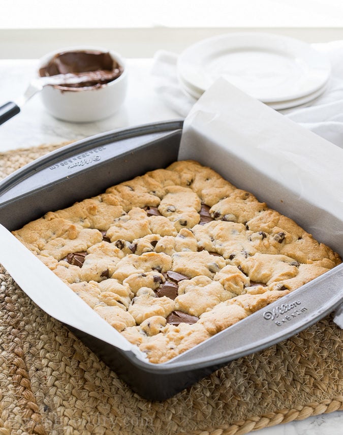 These Chocolate Chip Crumb Bars have a gooey chocolate hazelnut center and are made with just 4 simple ingredients, including muffin mix! So easy!