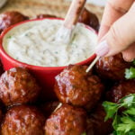 These Cranberry Meatballs with Sour Cream Herb Dip are super simple to make and are bursting with flavor! Perfect appetizer for this holiday season!