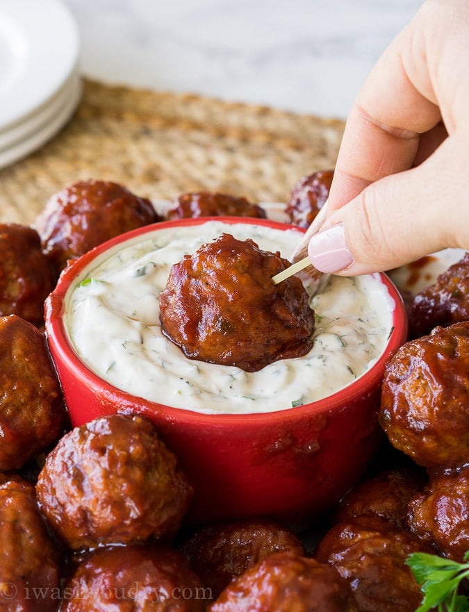 These Cranberry Meatballs with Sour Cream Herb Dip are super simple to make and are bursting with flavor! Perfect appetizer for this holiday season!