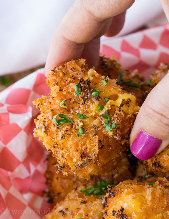 OMG! These Crispy Queso Bites are coated in nacho cheese doritos and then fried to gooey cheesy perfection!