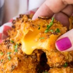 OMG! These Crispy Queso Bites are coated in nacho cheese doritos and then fried to gooey cheesy perfection!