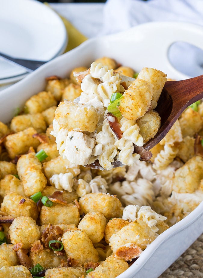 This Ultimate Chicken Bacon Ranch Casserole is filled with creamy pasta and topped with crispy tater tots! This is truly a family favorite where there are never any leftovers!