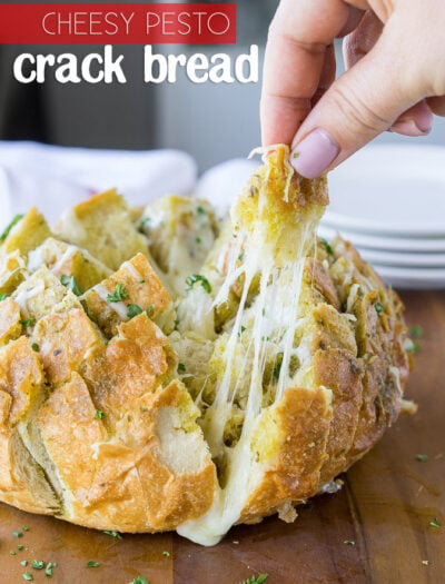 This Cheesy Pesto Crack Bread is a super quick and easy appetizer that everyone will go nuts for!
