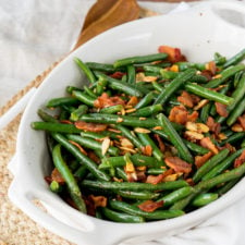 These Southern Green Beans with Bacon and Almonds are a side dish recipe that's a staple at any holiday dinner! Full of flavor and super easy to make, my whole family loves these!