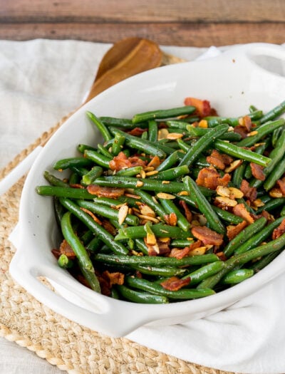 These Southern Green Beans with Bacon and Almonds are a side dish recipe that's a staple at any holiday dinner! Full of flavor and super easy to make, my whole family loves these!
