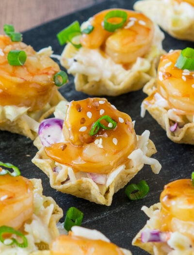 These Teriyaki Shrimp Taco Bites are everything you love about a shrimp taco, but in a pop-able bite-sized form! Saucy coleslaw, tender, sweet teriyaki shrimp and a crunchy tortilla chip scoop! Perfect for appetizers!