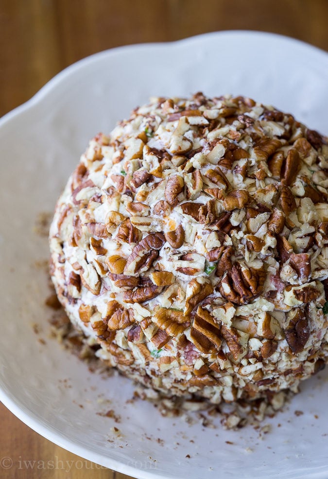 This Corned Beef and Cheddar Cheeseball is packed with flavor and rolled in chopped pecans for an irresistible appetizer that everyone will love!