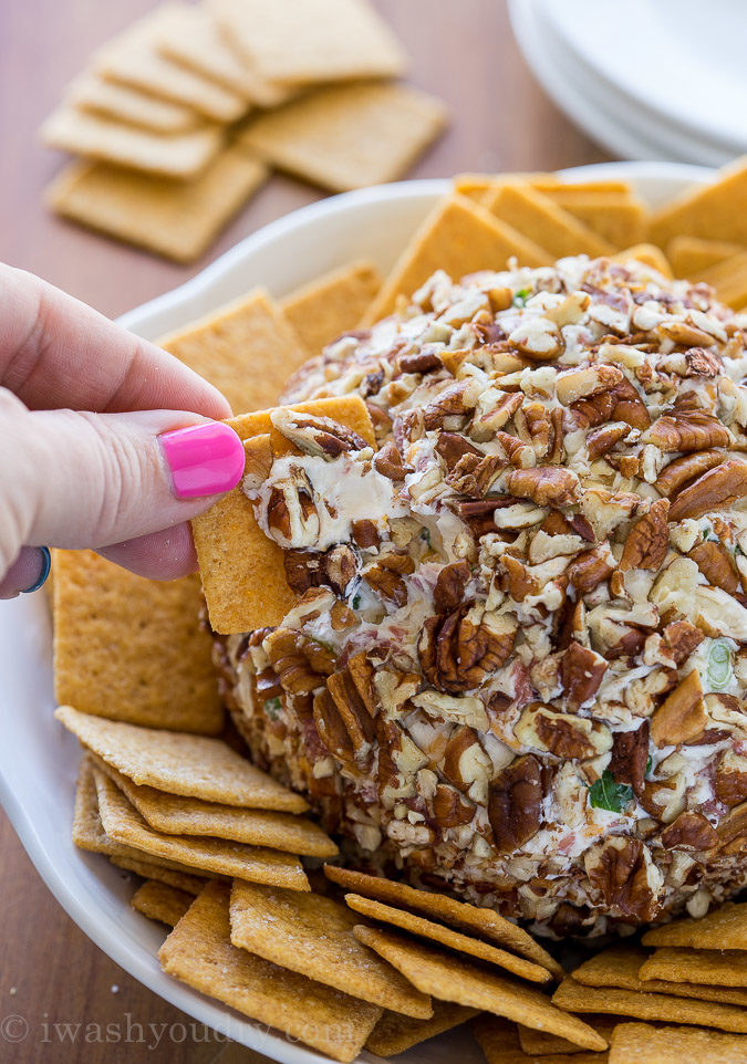 This Corned Beef and Cheddar Cheeseball is packed with flavor and rolled in chopped pecans for an irresistible appetizer that everyone will love!