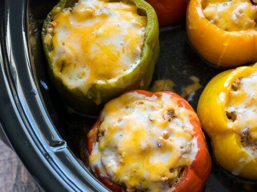 These Slow Cooker Steakhouse Stuffed Peppers are bursting with flavor and only take a few minutes to prep! The perfect easy weeknight dinner recipe!