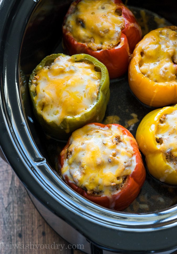 These Slow Cooker Steakhouse Stuffed Peppers are bursting with flavor and only take a few minutes to prep! The perfect easy weeknight dinner recipe!