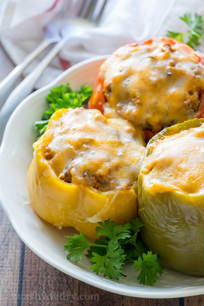 These Slow Cooker Steakhouse Stuffed Peppers are bursting with flavor and only take a few minutes to prep! The perfect easy weeknight dinner recipe!