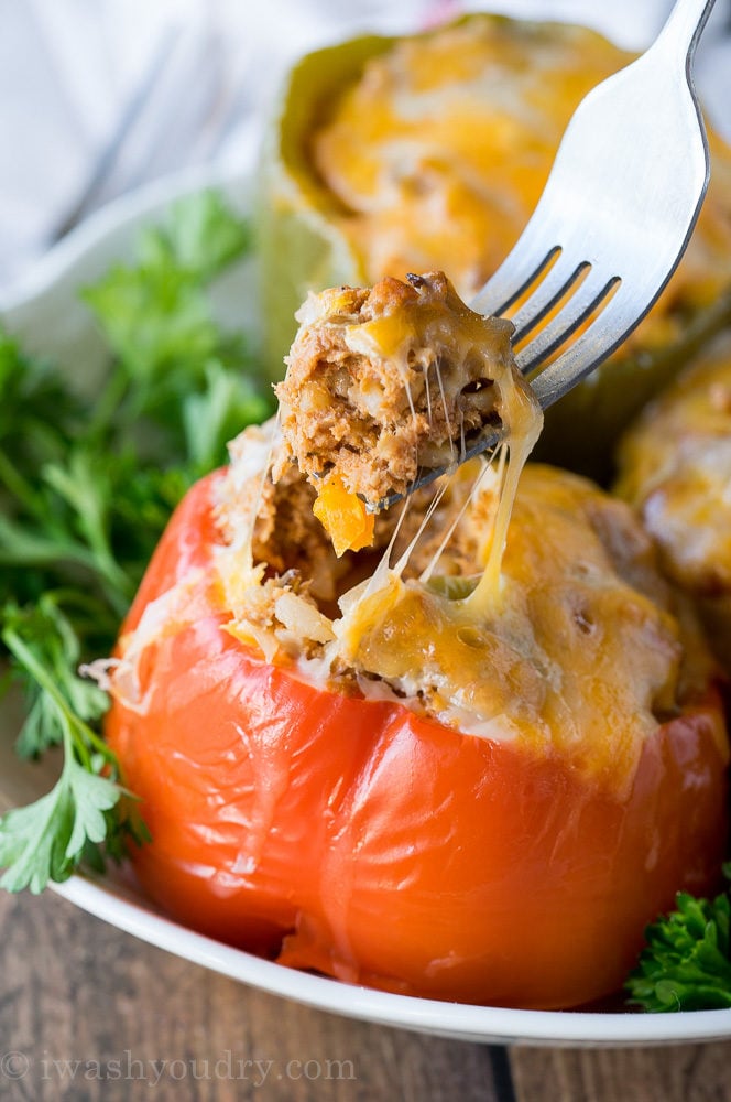 These Slow Cooker Steakhouse Stuffed Peppers are bursting with flavor and only take a few minutes to prep! The perfect easy weeknight dinner recipe!