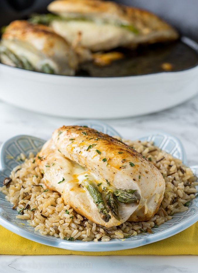 Easy weeknight baked chicken recipe with asparagus and cheese.