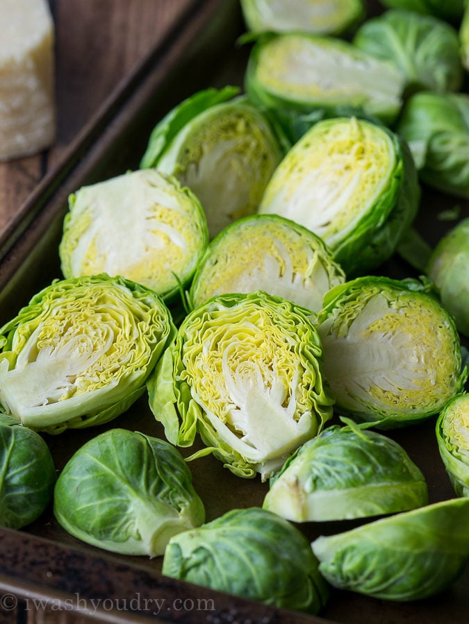 Fresh Brussels Sprouts on baking sheet, ready for the oven.