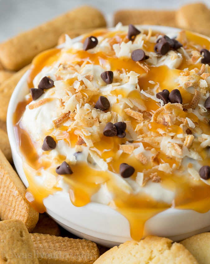 OH MY GOSH!! This Coconut Chocolate Caramel Cookie Dip is SO GOOD with graham cracker sticks! The Yoplait Custard yogurt in the dip really makes this recipe amazing!