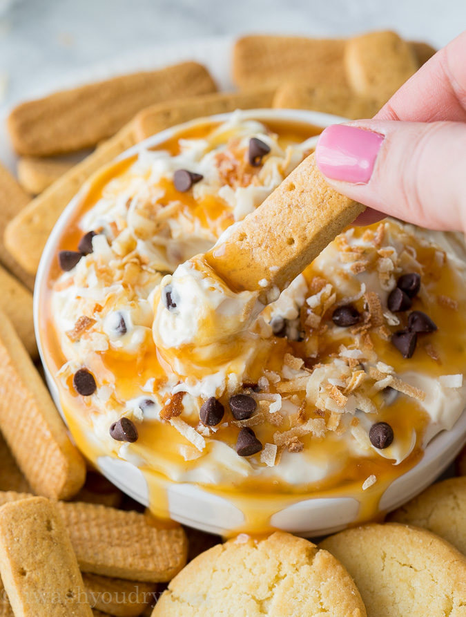 OH MY GOSH!! This Coconut Chocolate Caramel Cookie Dip is SO GOOD with graham cracker sticks! The Yoplait Custard yogurt in the dip really makes this recipe amazing!