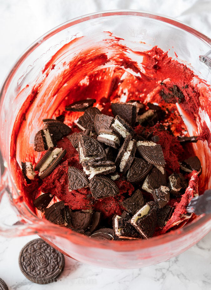 These Red Velvet Oreo Gooey Butter Cake Cookies are just 5 ingredients! I made a batch for a friend but couldn't stop eating them myself!