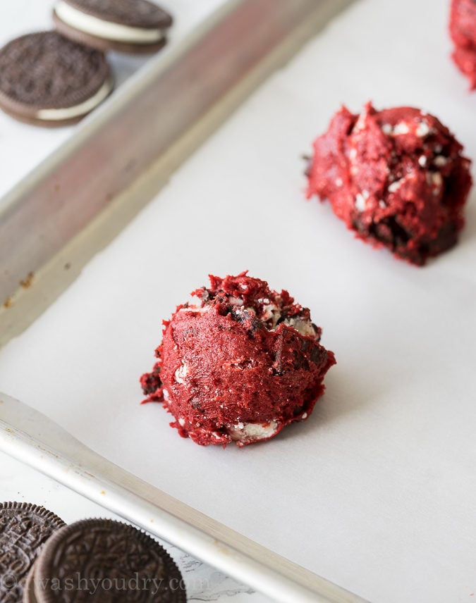 These Red Velvet Oreo Gooey Butter Cake Cookies are just 5 ingredients! I made a batch for a friend but couldn't stop eating them myself!