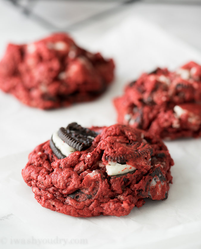 These Red Velvet Oreo Gooey Butter Cake Cookies are just 5 ingredients! I made a batch for a friend but couldn't stop eating them myself!