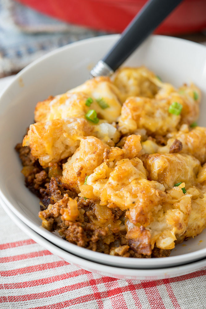 Comfort food and convenience come together in this super easy Sloppy Joe Tater Tot Skillet recipe! My whole family loved this one!