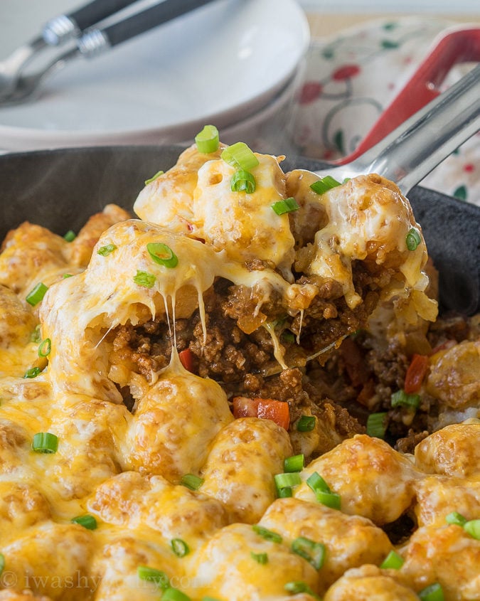 Comfort food and convenience come together in this super easy Sloppy Joe Tater Tot Skillet recipe! My whole family loved this one!