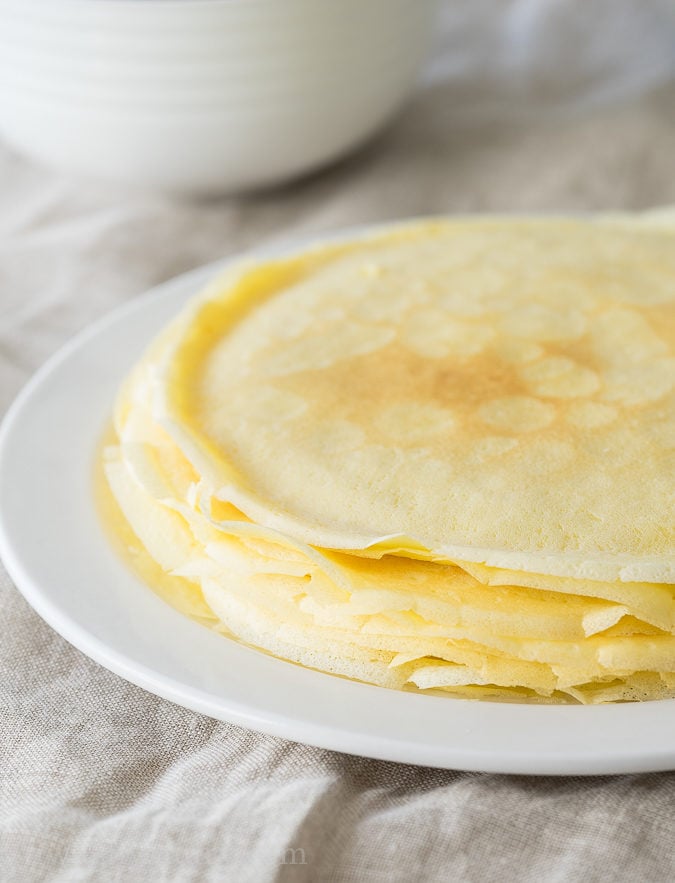 These Boston Cream Pie Crepes are filled with a light and fluffy cream filling and topped with a silky chocolate ganache! My whole family loved this super easy breakfast!