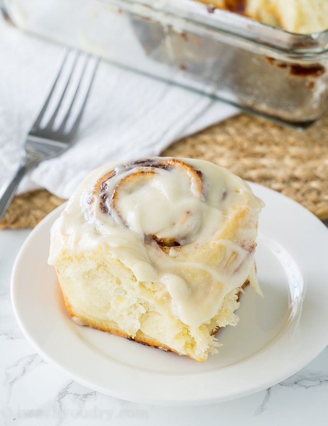 This Super Easy Cinnamon Rolls Recipe is so delicious! Soft and tender and filled with loads of that gooey cinnamon flavor!