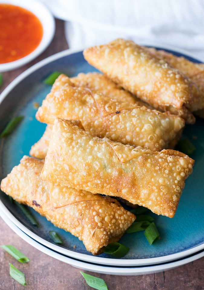 This Crispy Chicken Egg Rolls Recipe is just as good as takeout for a fraction of the cost and super easy to make too!