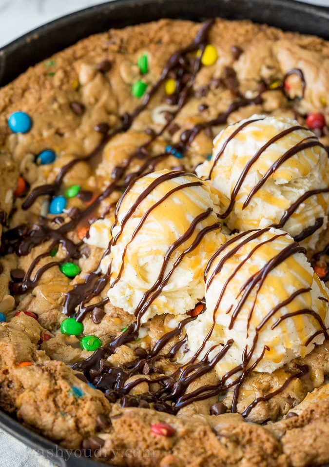 OMG! This One Skillet Fully Loaded Chocolate Chip Cookie recipe is insanely delicious and SUPER EASY to make too! No mixing bowls required for this one!