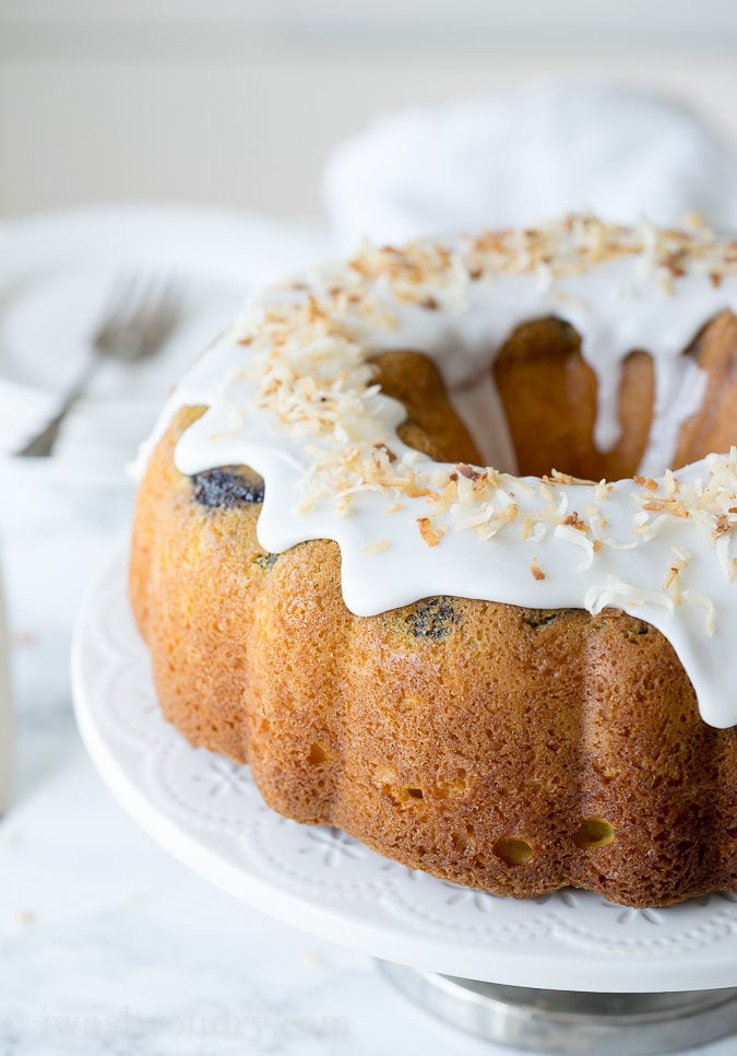 This Lemon Blueberry Surprise Cake is deliciously moist and filled with a surprise blueberry filling! It's so easy to make too!