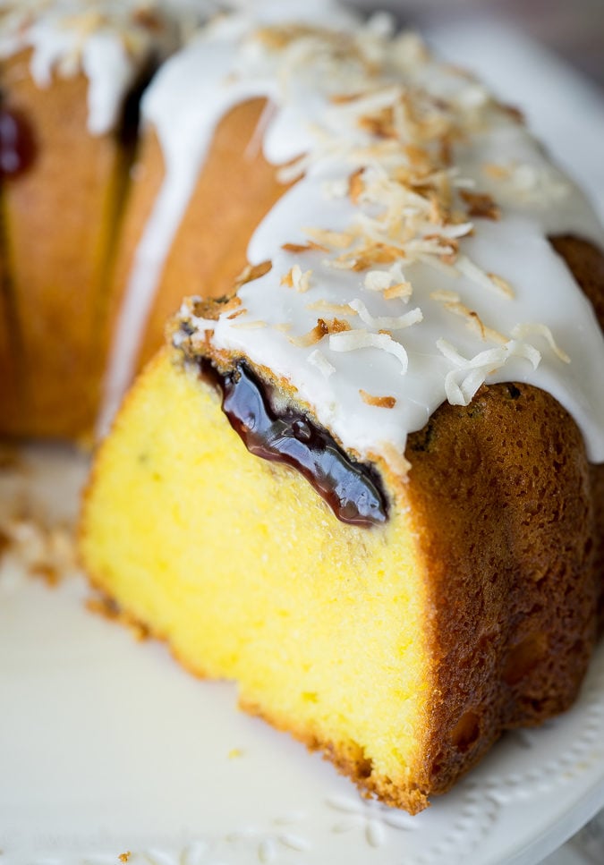 This Lemon Blueberry Surprise Cake is deliciously moist and filled with a surprise blueberry filling! It's so easy to make too!