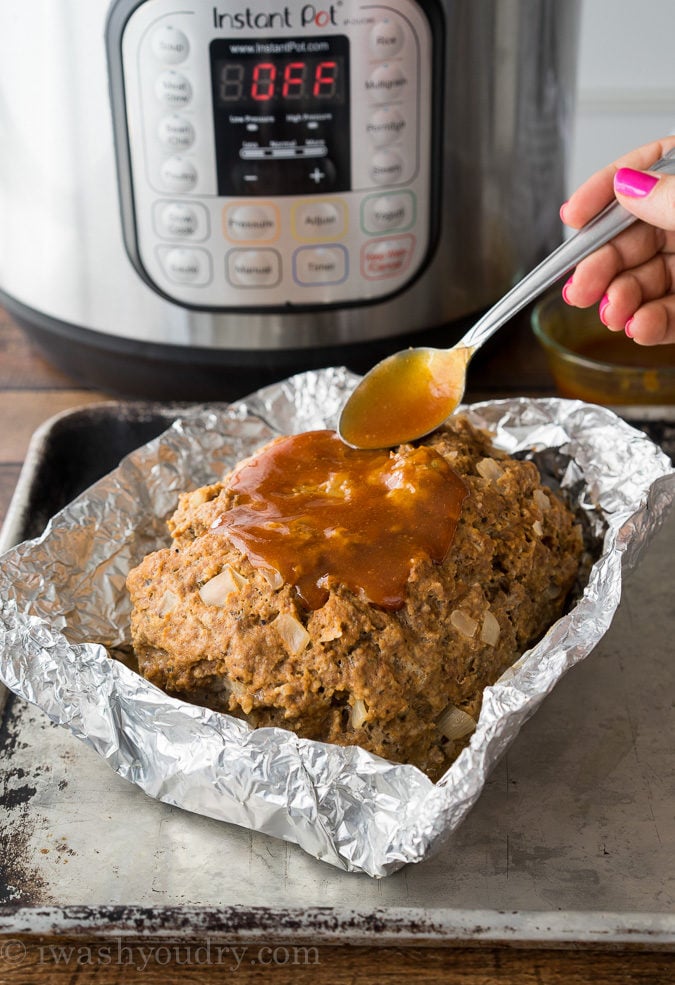Once the meatloaf is cooked, brush on the simple glaze and pop under the broiler for just a minute to let it caramelize.
